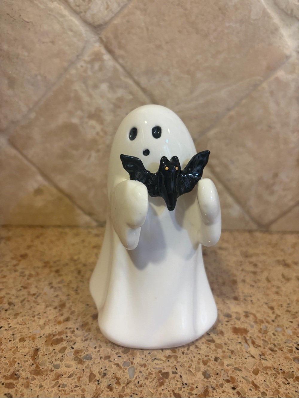 Hyde & EEK white ghost holding a bat